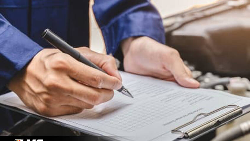 A person Check And note Car MOT and its all parts